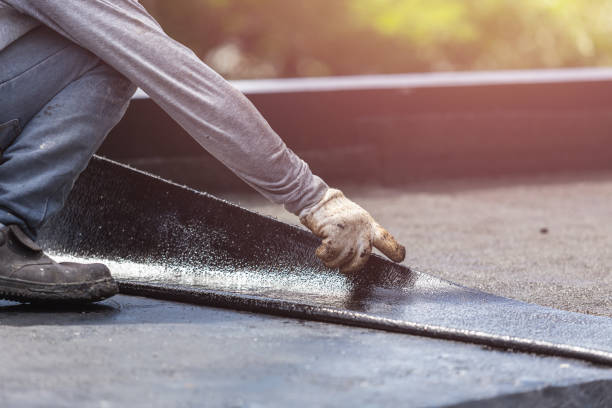Professional Exterior Waterproofing technician working in Canandaigua, NY